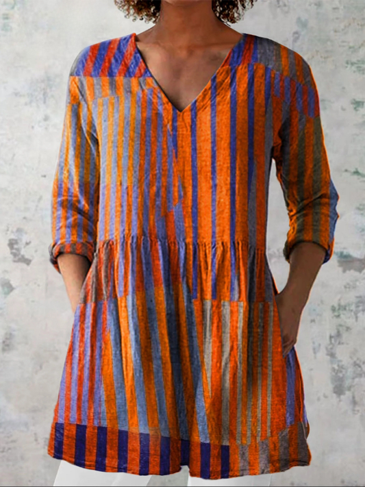 ナディア | Vネックのロングブラウス
