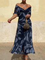 Belinda | Vestido elegante azul oscuro con estampado de hojas