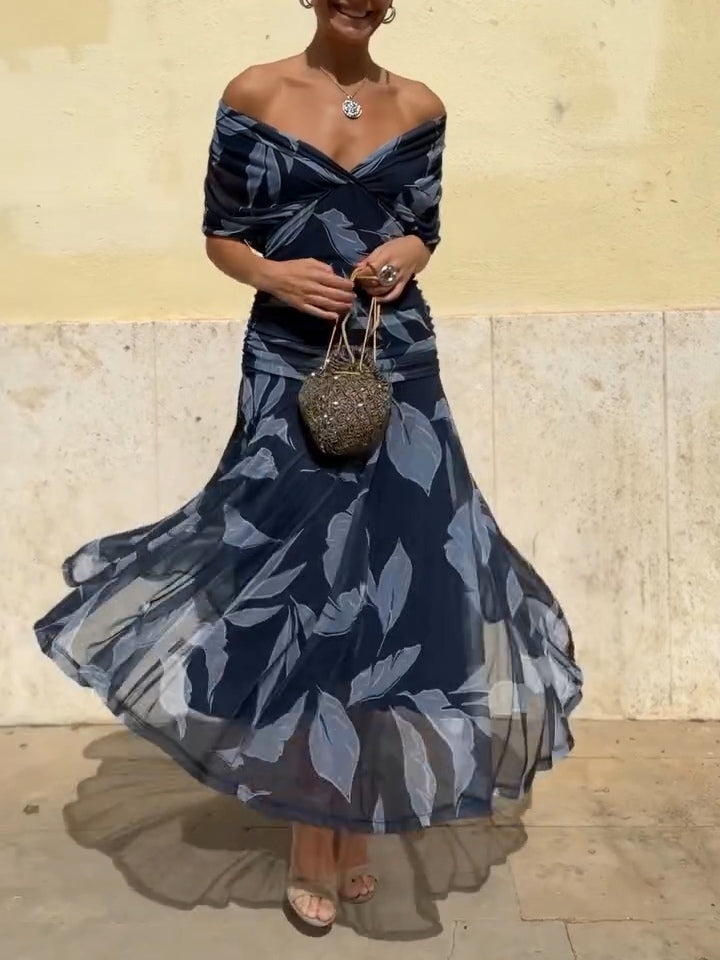 Belinda | Vestido elegante azul oscuro con estampado de hojas